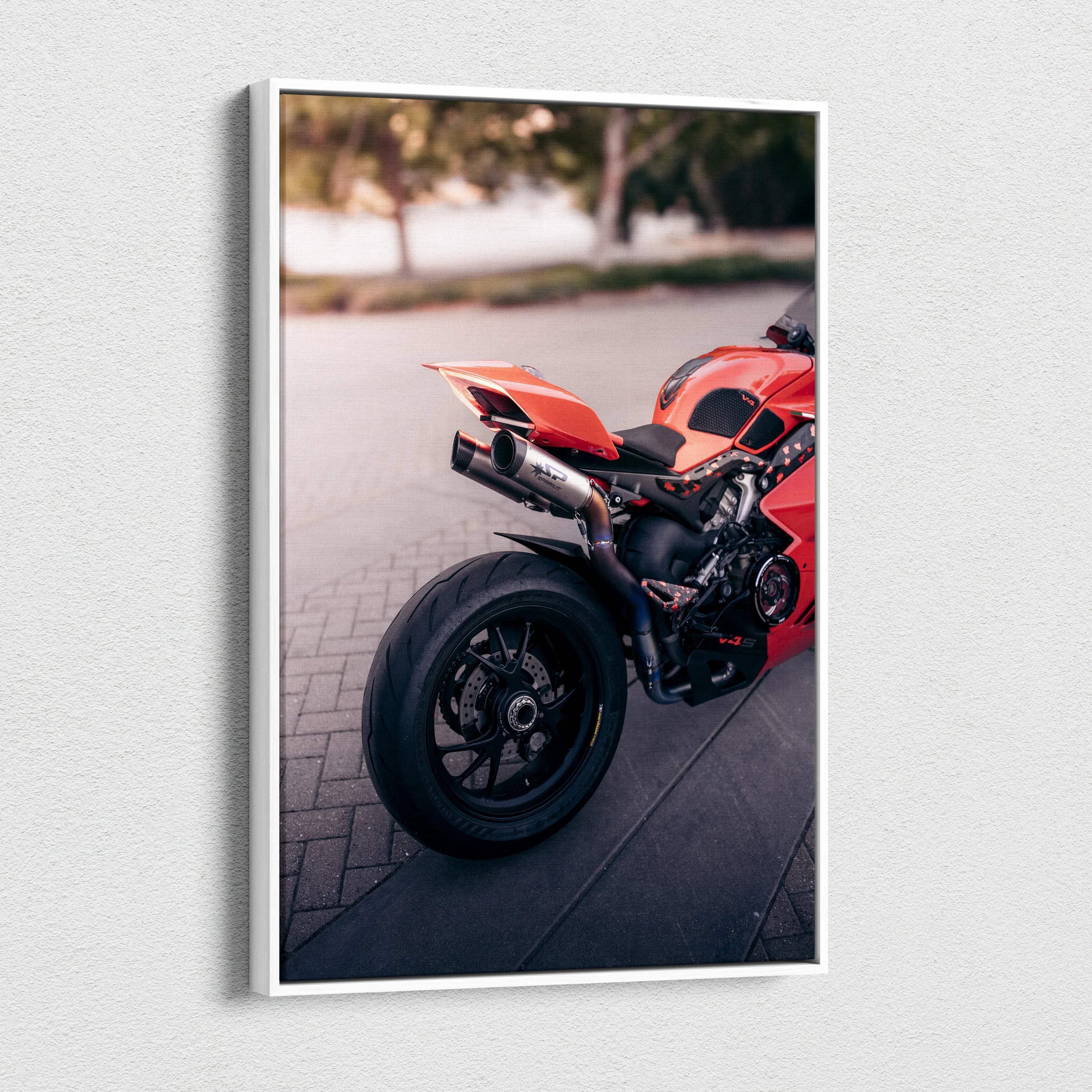 Vertical canvas art featuring the rear side of a red Ducati Panigale V4S motorcycle on a blurred outdoor background.
