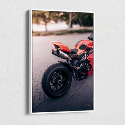 Vertical canvas art featuring the rear side of a red Ducati Panigale V4S motorcycle on a blurred outdoor background.