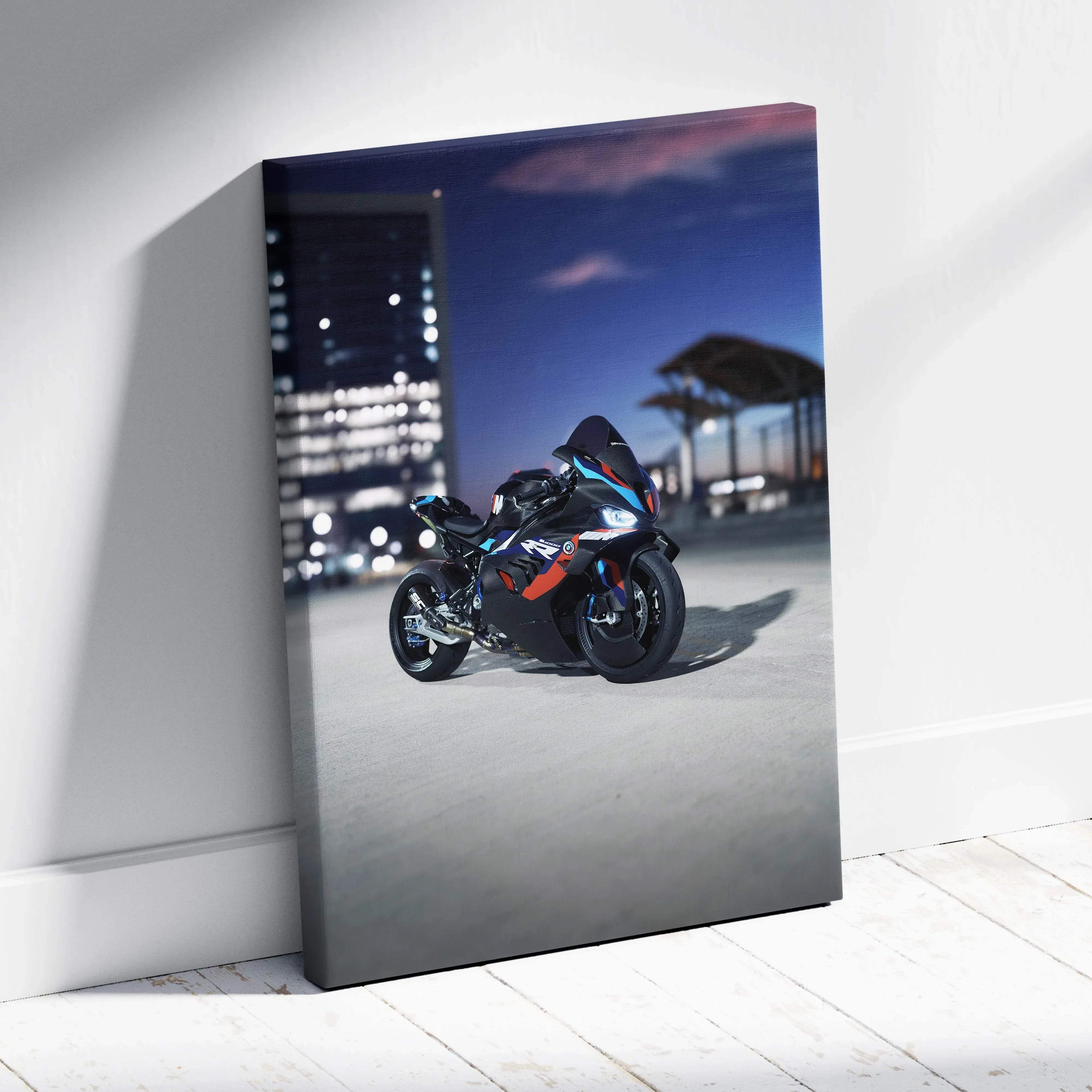 Black and blue canvas wall art featuring a sleek bmw inspired m1000rr sportbike with orange accents on white wall