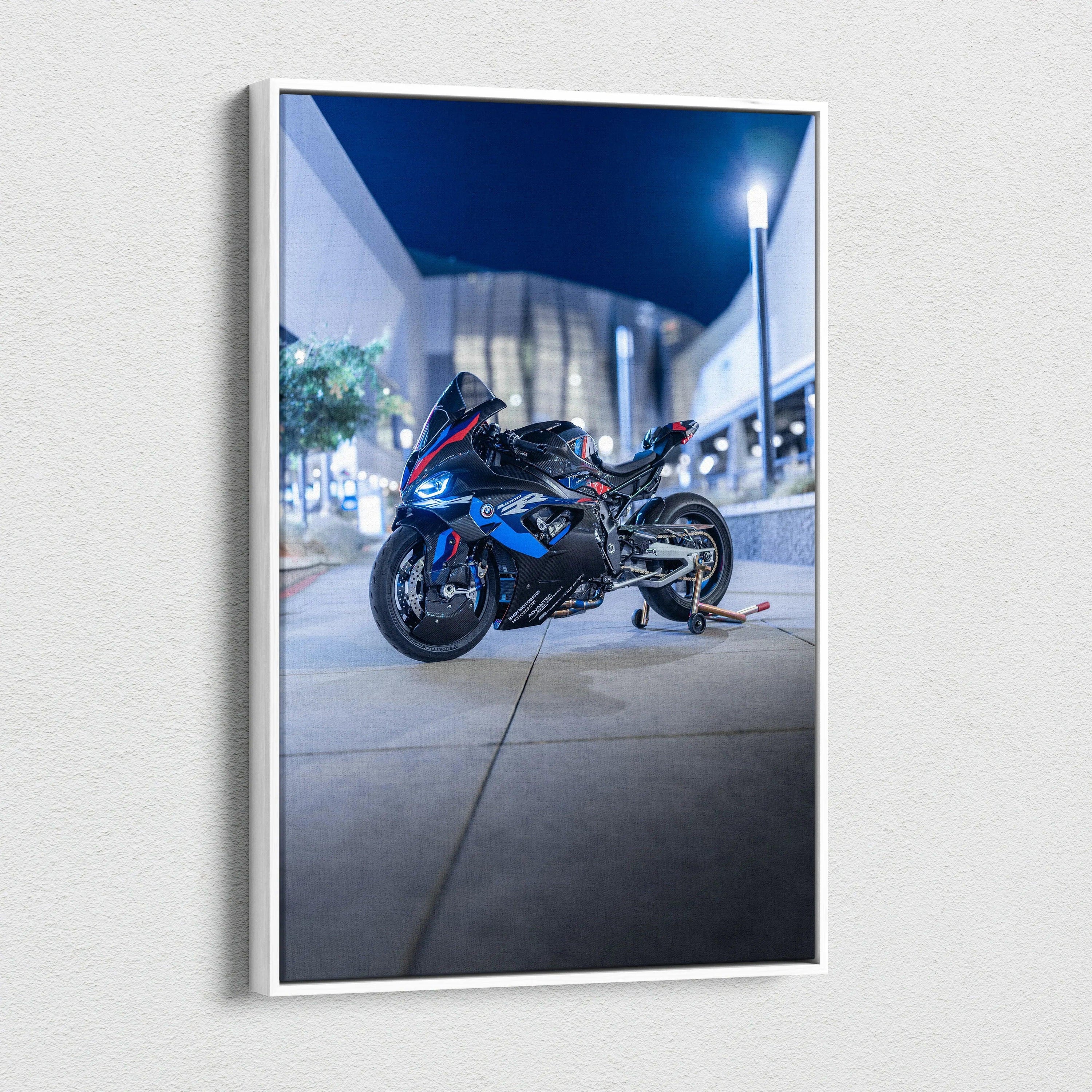BMW M1000RR motorcycle vertical canvas art with modern urban night backdrop.