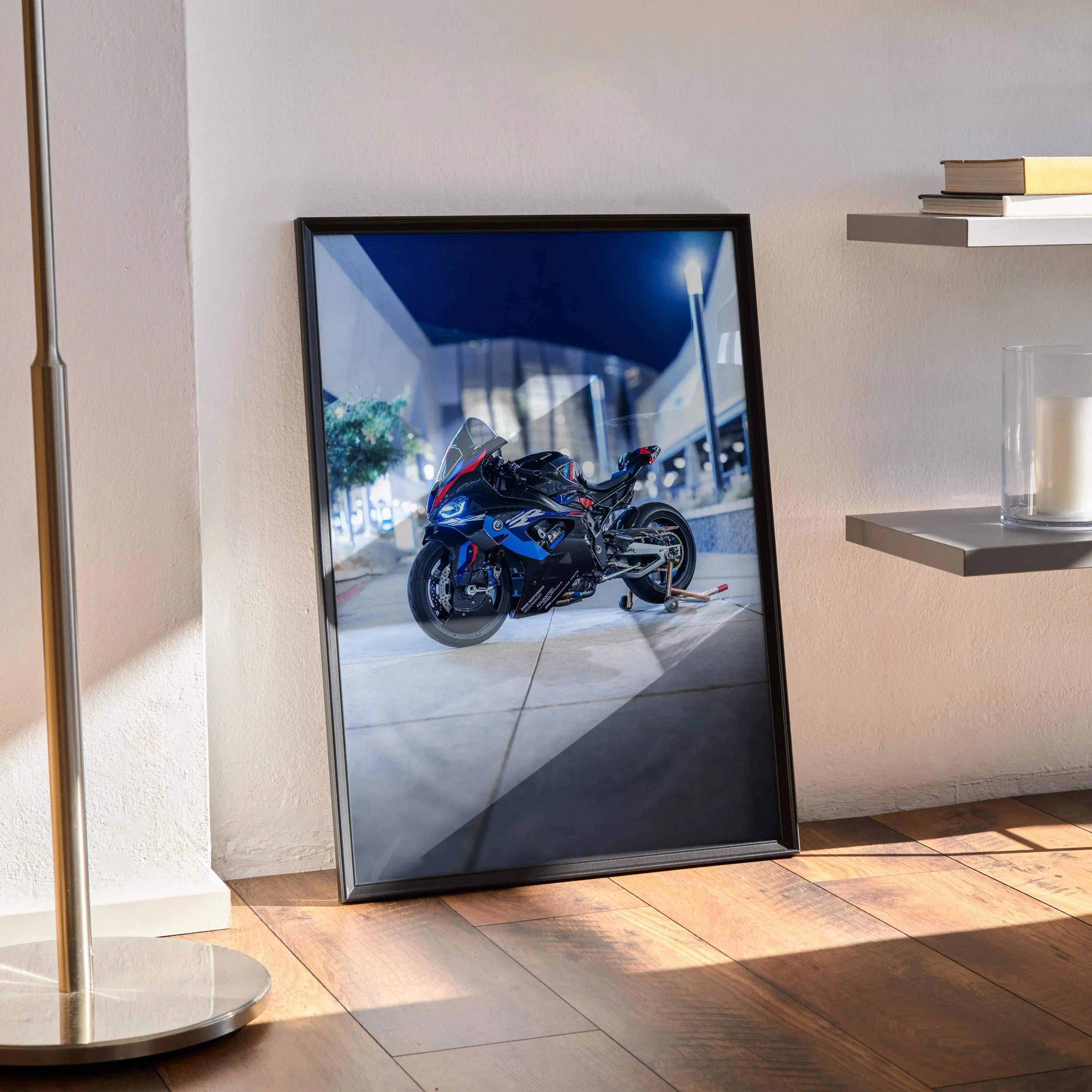 BMW M1000RR motorcycle poster with vibrant night city backdrop, sleek black frame wall art.