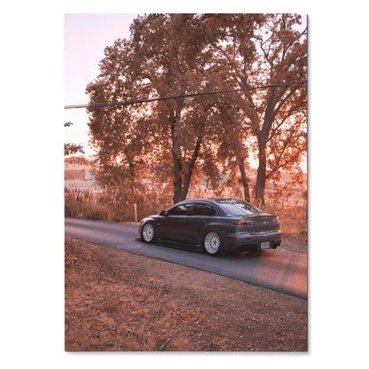 Mitsubishi Evo X parked on rural road with autumn trees background poster wall art.