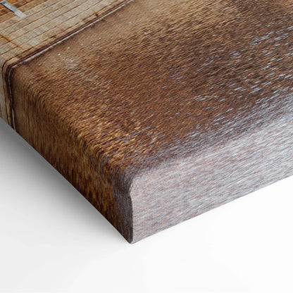 Brown textured canvas wall art print with a detailed architectural design and visible canvas texture.