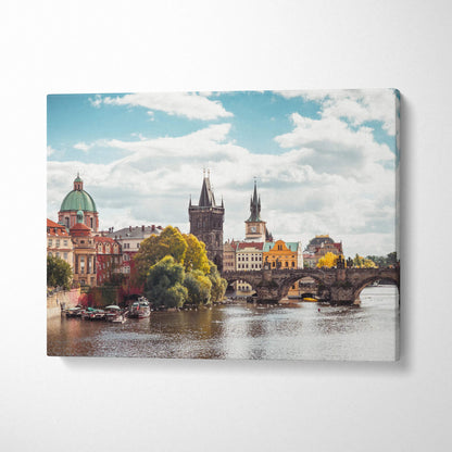 Canvas wall art of historic European architecture with river and blue sky details.