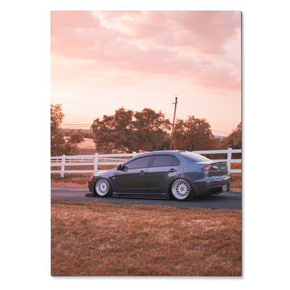 Mitsubishi Evo 10 parked on a rural road at sunset, high-resolution poster wall art.