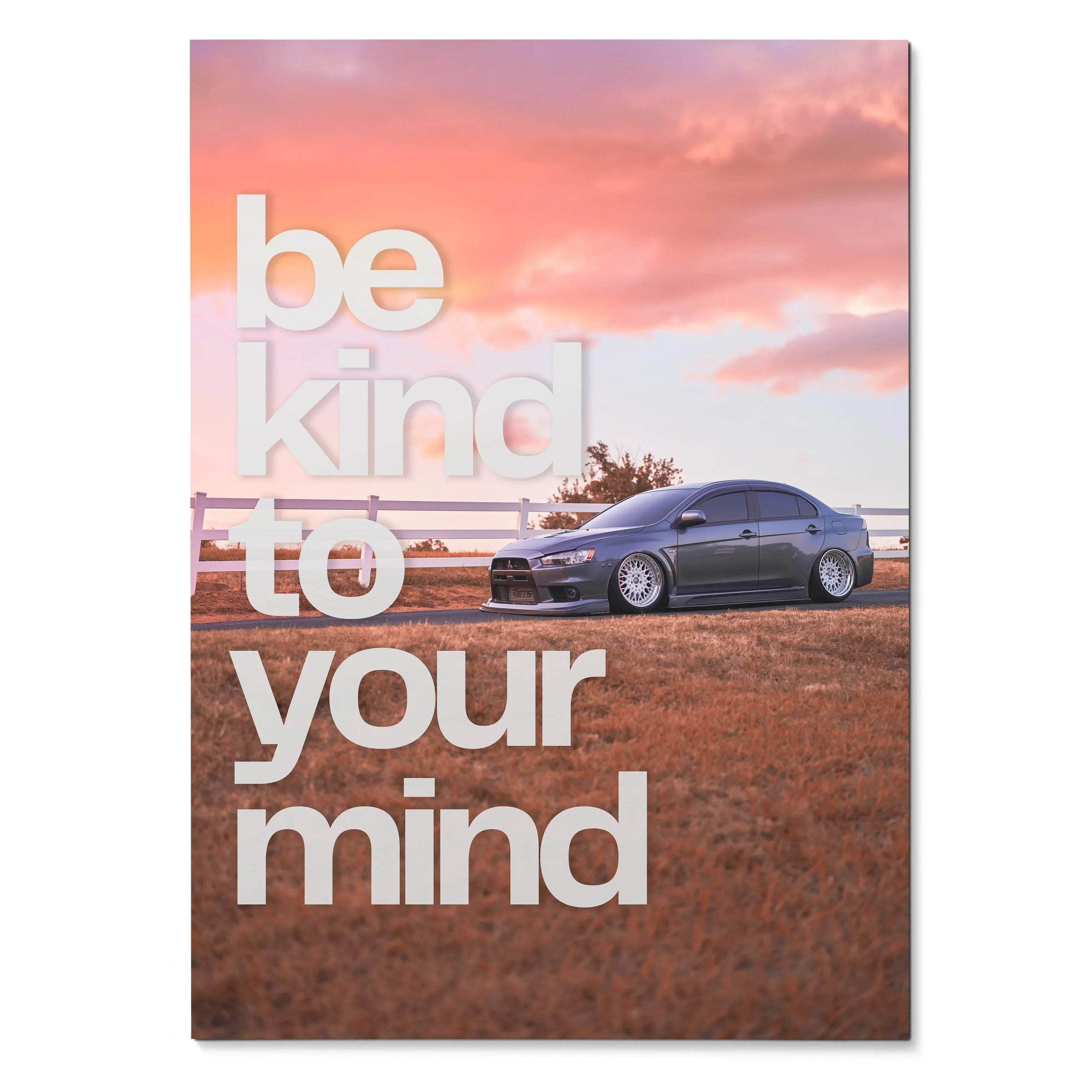 Motivational poster wall art with Mitsubishi Evo 10 under a pink sunset sky and white "be kind to your mind" text.