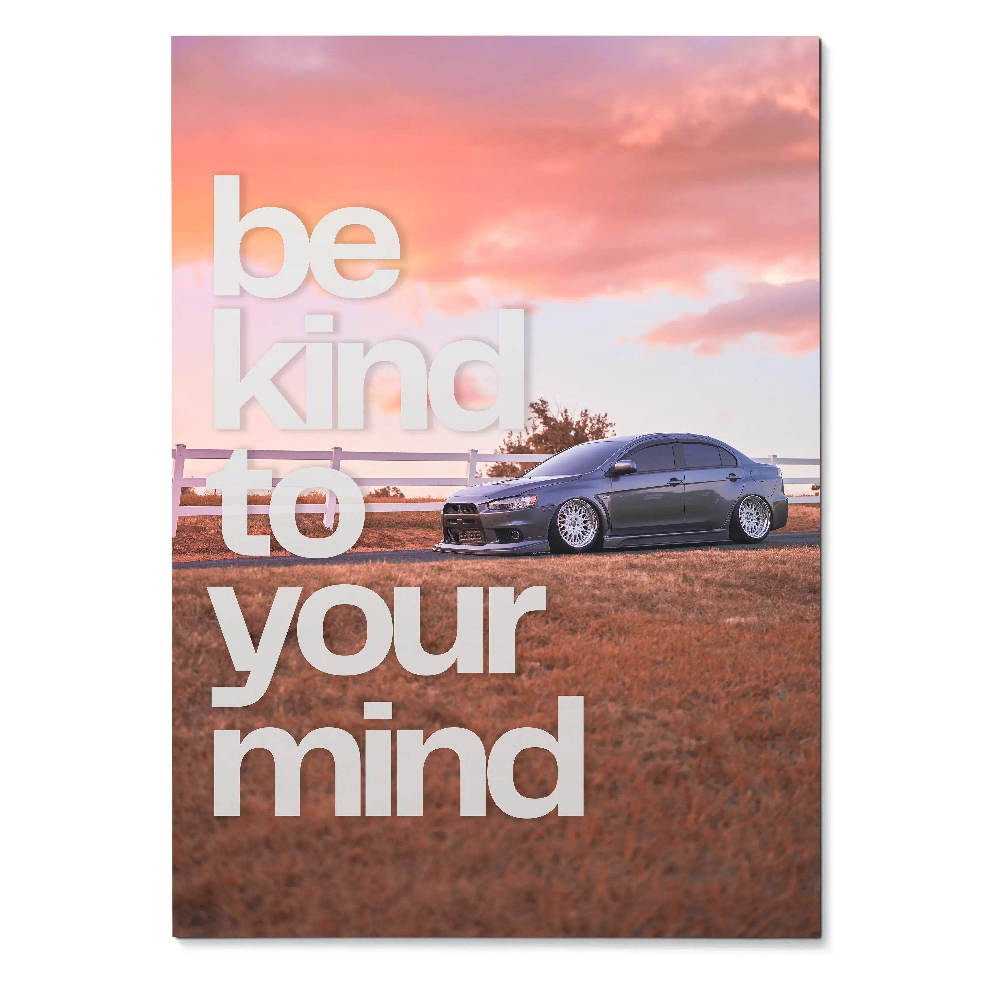 Motivational poster wall art with Mitsubishi Evo 10 under a pink sunset sky and white "be kind to your mind" text.