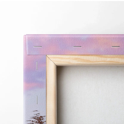 Close-up of stretched canvas art on wooden frame with pastel purple and pink edge for wall art display.