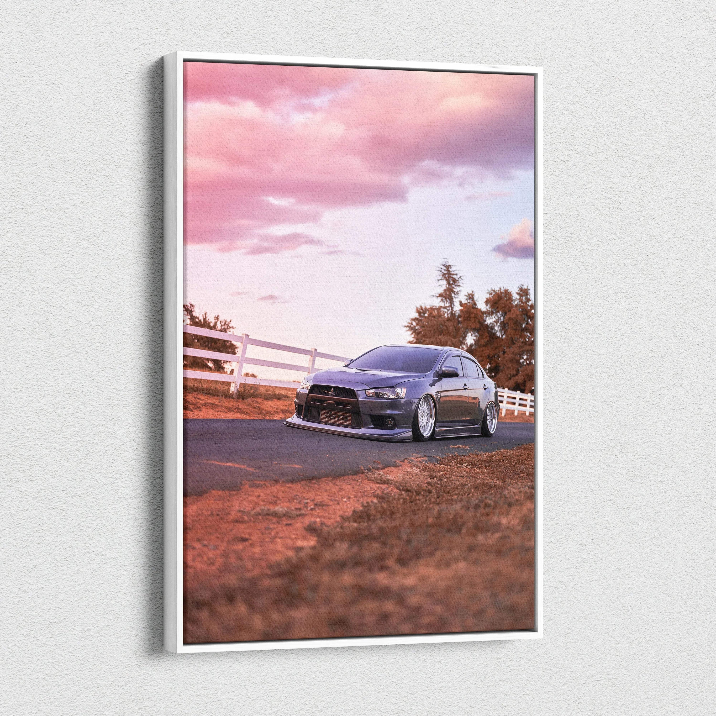Mitsubishi Evo 10 parked on road at sunset vertical canvas wall art with pink sky and trees.
