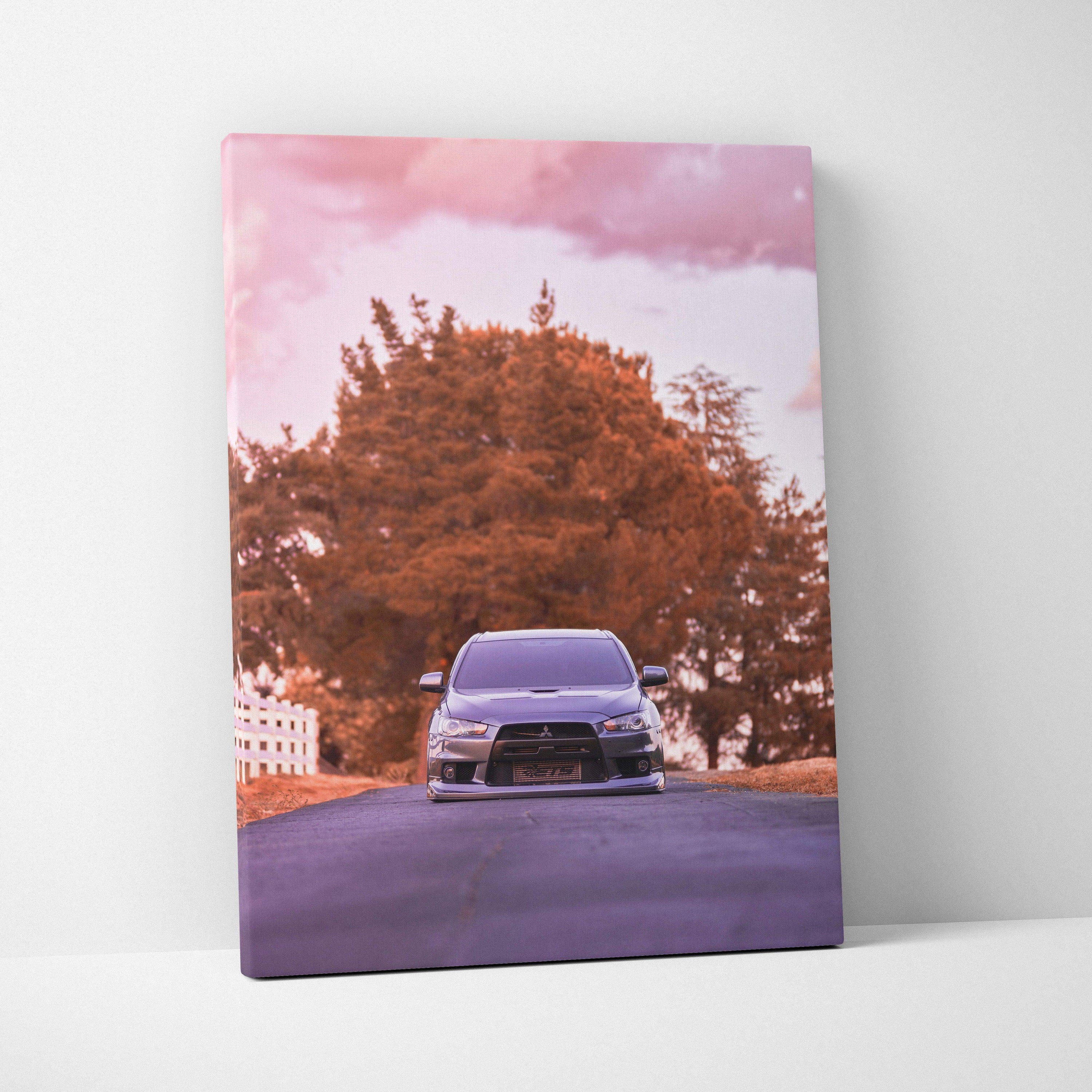 Vertical canvas art featuring a Mitsubishi Evo 10 car with a reddish tree and pink sky background, wall art for car.
