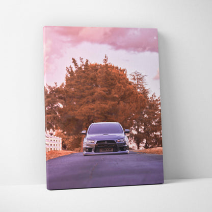 Vertical canvas art featuring a Mitsubishi Evo 10 car with a reddish tree and pink sky background, wall art for car.