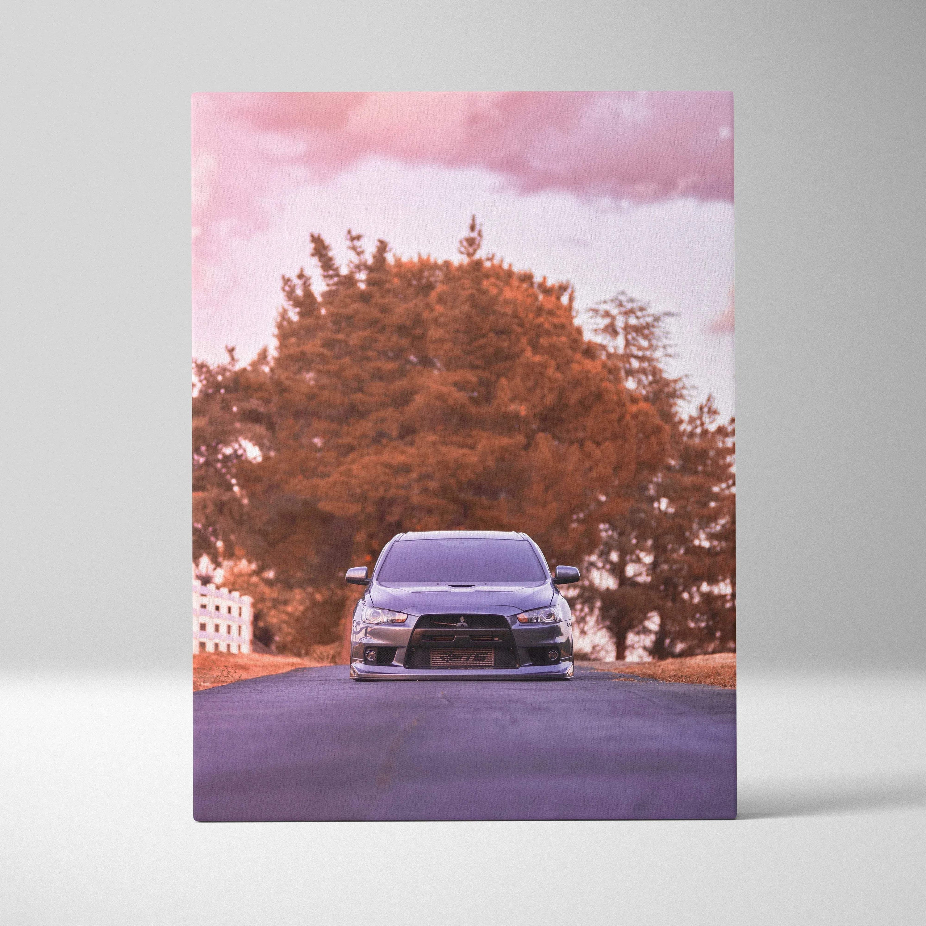 Mitsubishi Evo 10 car in front of large tree under pink sky vertical canvas wall art.