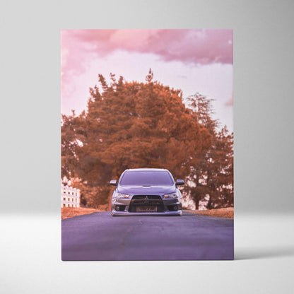 Mitsubishi Evo 10 car in front of large tree under pink sky vertical canvas wall art.