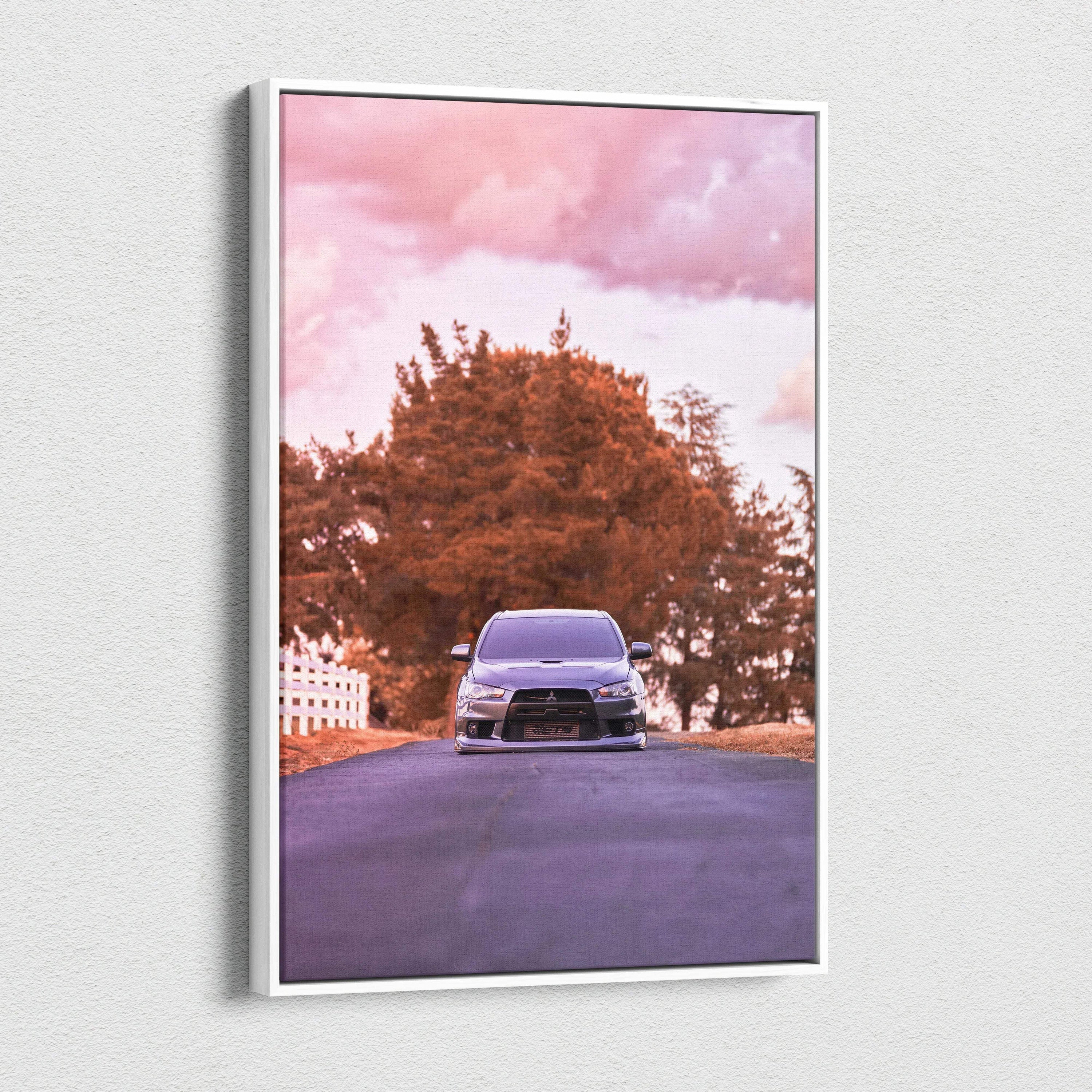 Vertical canvas wall art featuring a Mitsubishi Evo 10 on a street with autumn trees and a pink sky.