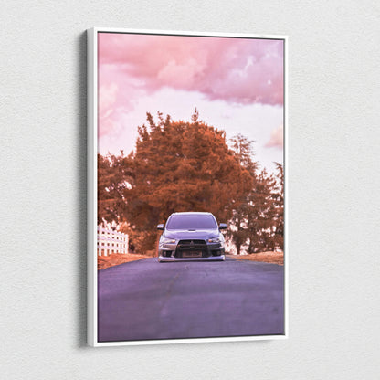 Vertical canvas wall art featuring a Mitsubishi Evo 10 on a street with autumn trees and a pink sky.