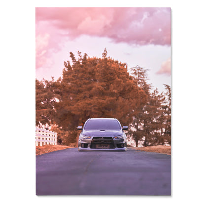 Mitsubishi Evo 10 front view on road with pink sky wall art poster.