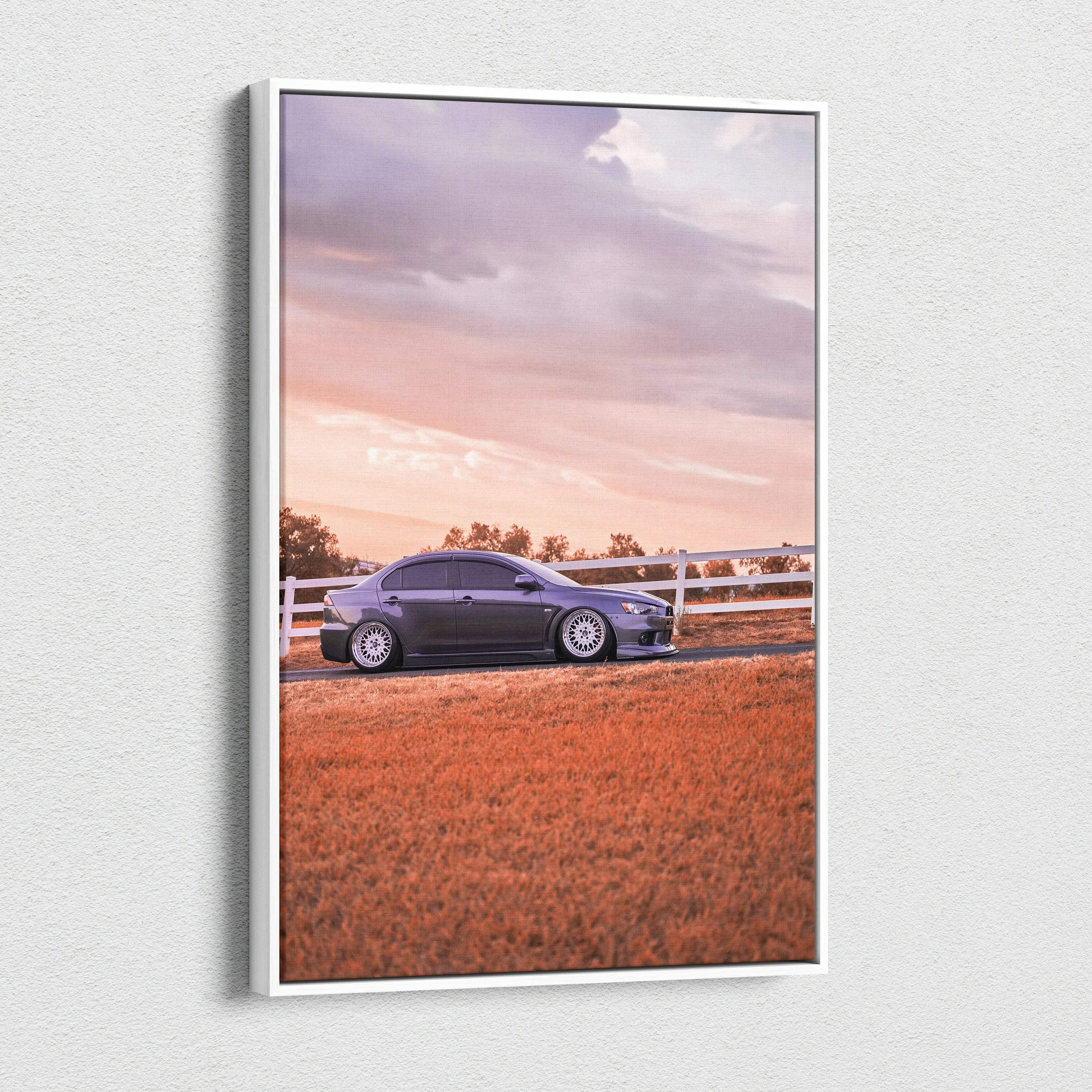 Vertical canvas art of a black Mitsubishi Evo 10 parked on a rural road at sunset wall art.