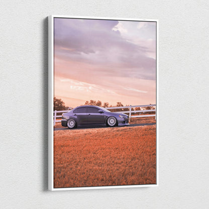 Vertical canvas art of a black Mitsubishi Evo 10 parked on a rural road at sunset wall art.