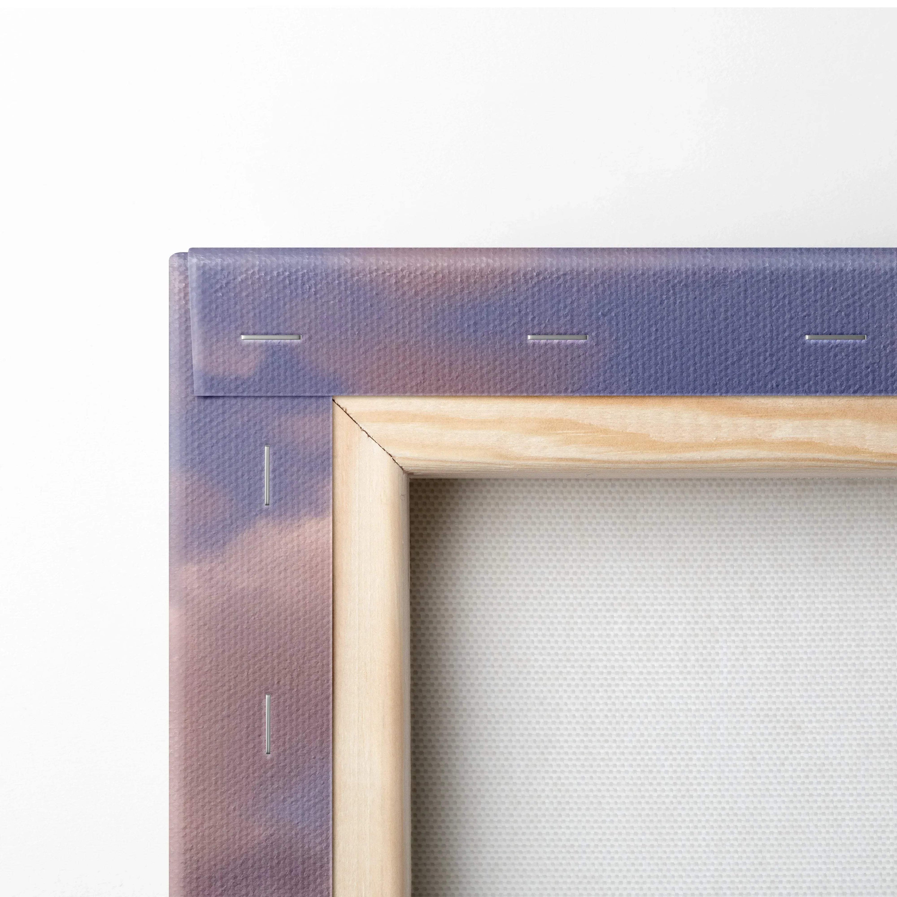 Close-up of corner-stapled wooden frame and canvas backing showcasing wall art construction details.