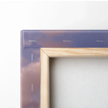 Close-up of corner-stapled wooden frame and canvas backing showcasing wall art construction details.