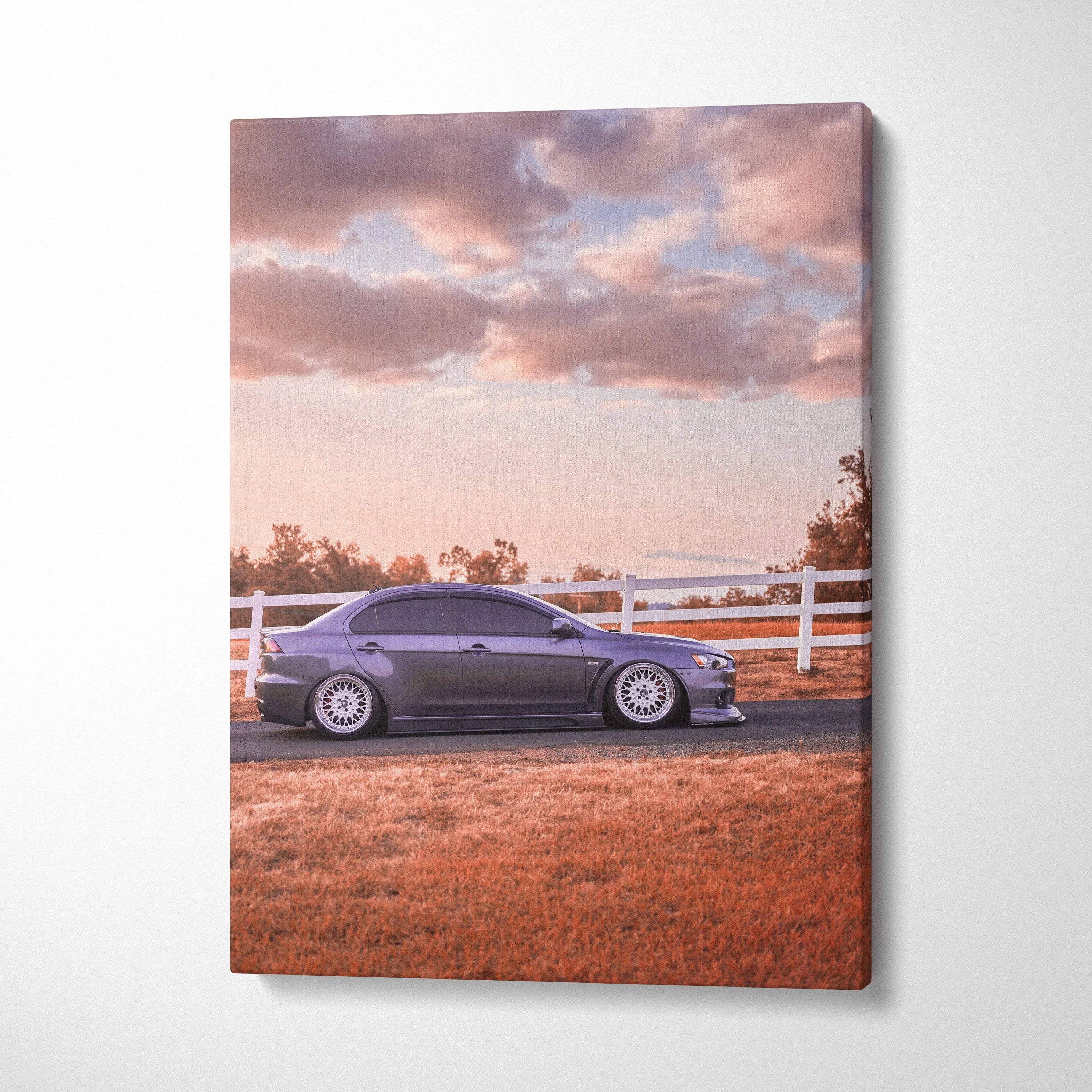 Mitsubishi Evo 10 canvas art with sunset sky and field, vertical wall art print.
