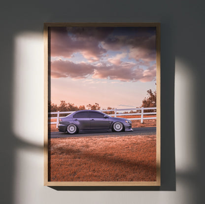 Mitsubishi Evo 10 in purple parked by white fence at sunset poster wall art.