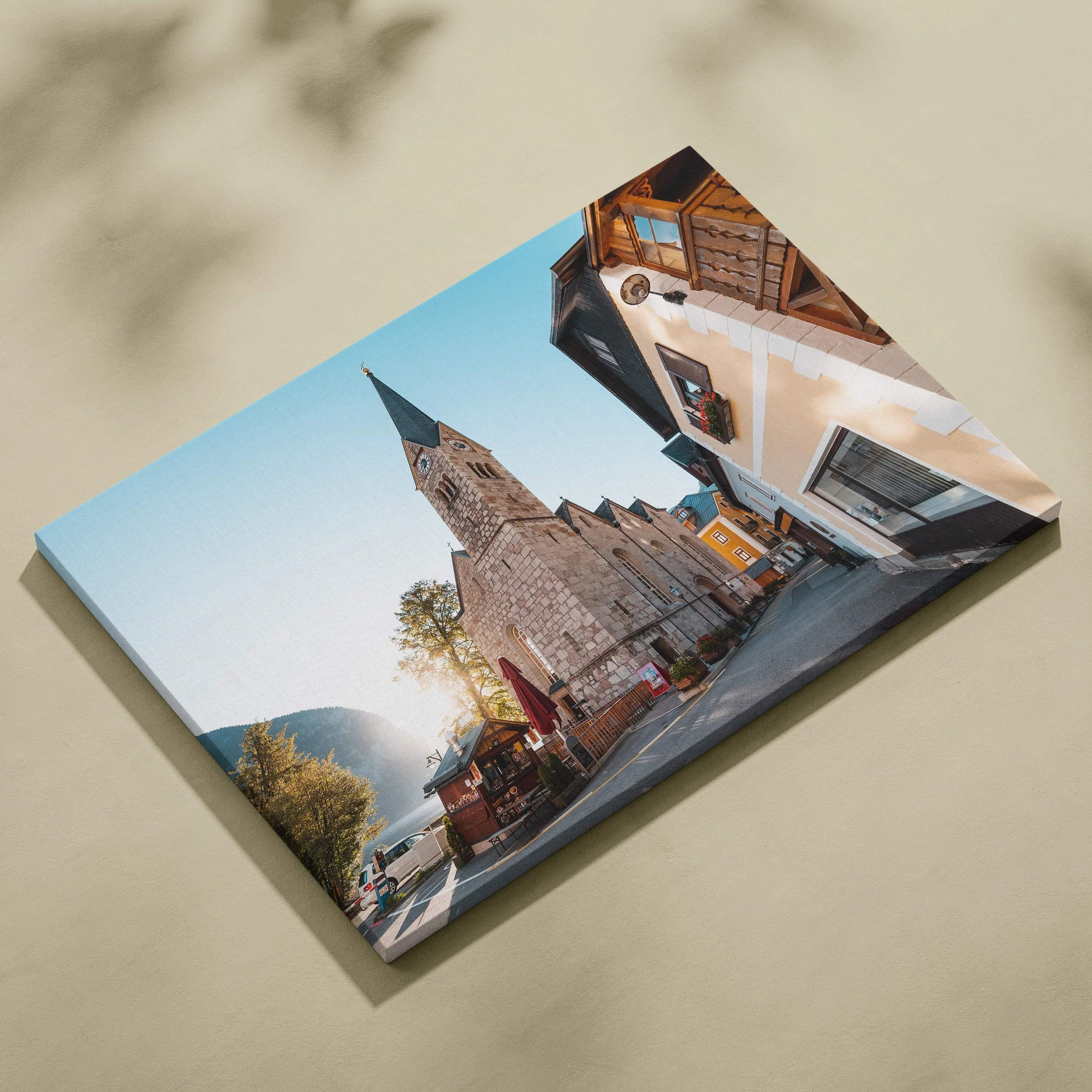 Canvas wall art featuring a detailed digital art print of a historic stone building under clear blue sky.