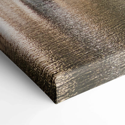 Close-up of textured canvas wall art with abstract architectural patterns in muted earth tones.