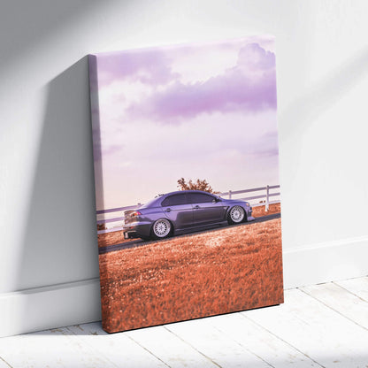 Mitsubishi Evo 10 driving on coastal road at sunset vertical canvas wall art.