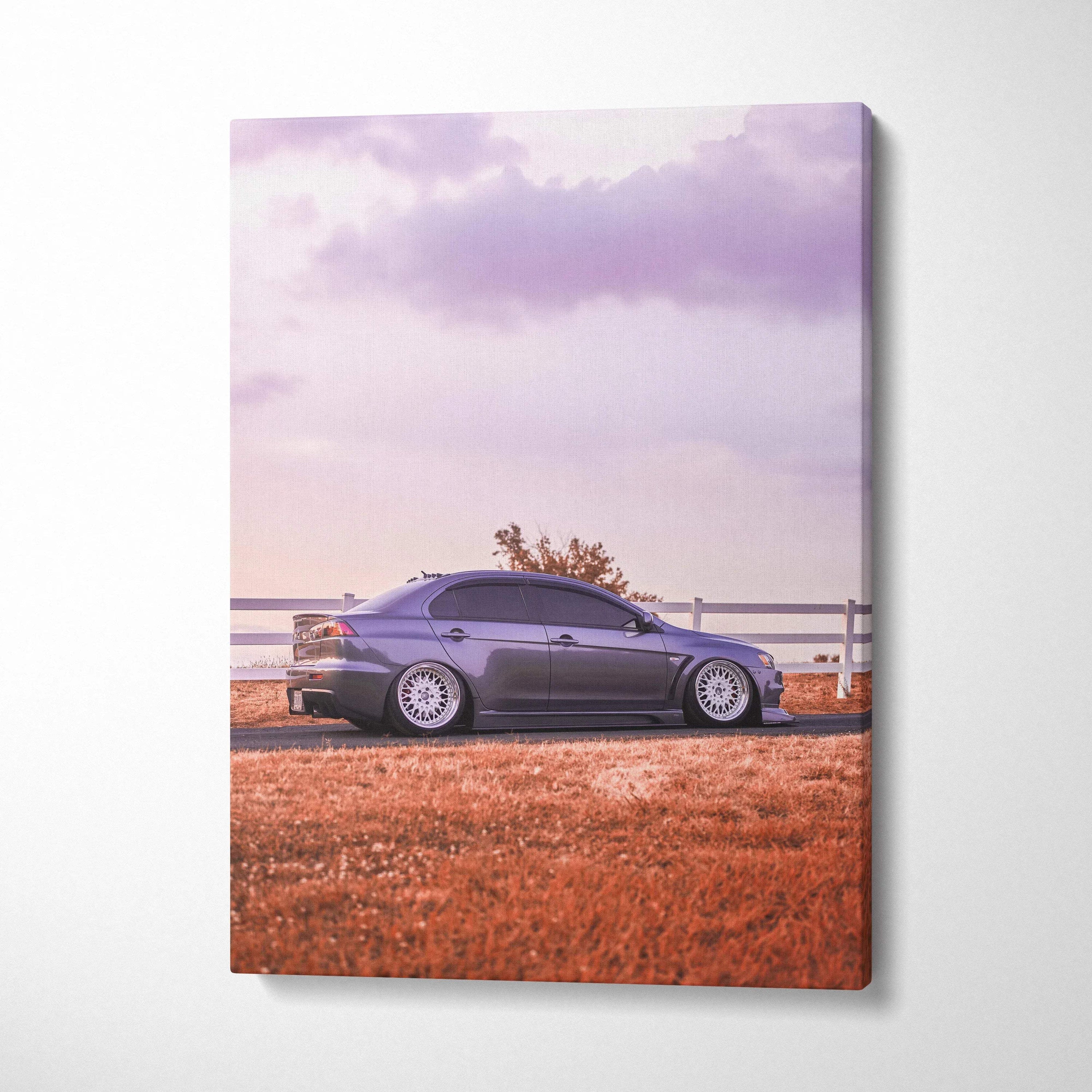 Mitsubishi Evo 10 parked on reddish grass under purple sky vertical canvas wall art.