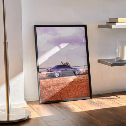 Mitsubishi Evo 10 car poster with purple sky and desert landscape wall art in black frame.