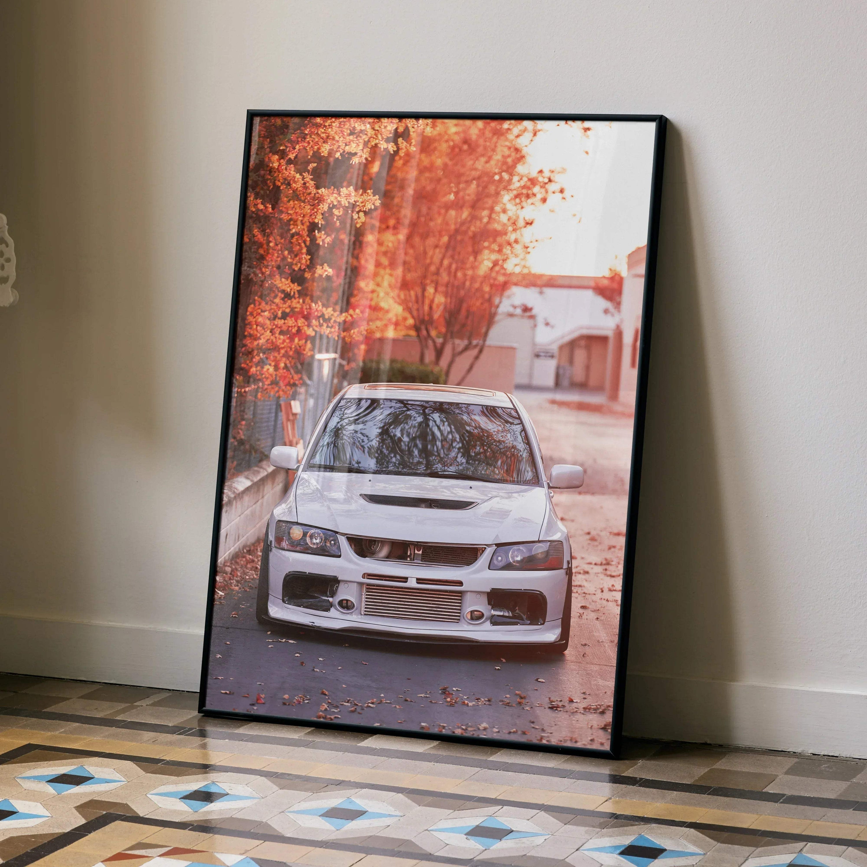 Mitsubishi Evo 8 poster with vibrant autumn background, high-resolution wall art in black frame.