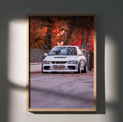 Mitsubishi Evo 8 poster with white car on autumn road wall art in wooden frame.
