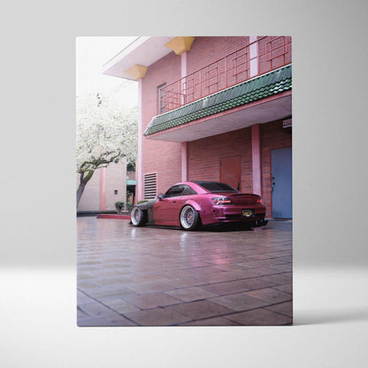 Honda S2000 sports car parked under balcony in pink building canvas wall art.