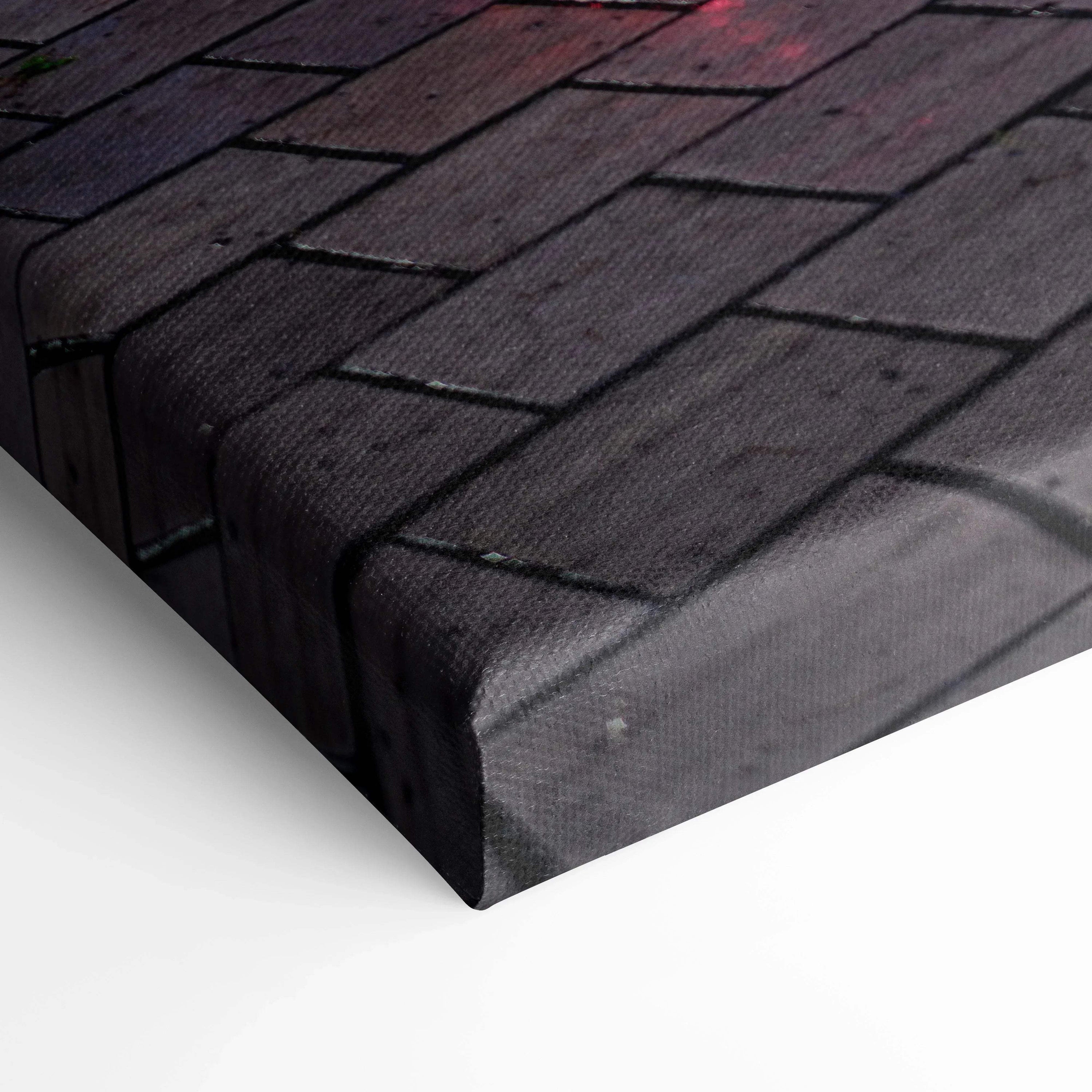 Close-up of textured canvas wall art with dark brick pattern, museum-quality print edge.