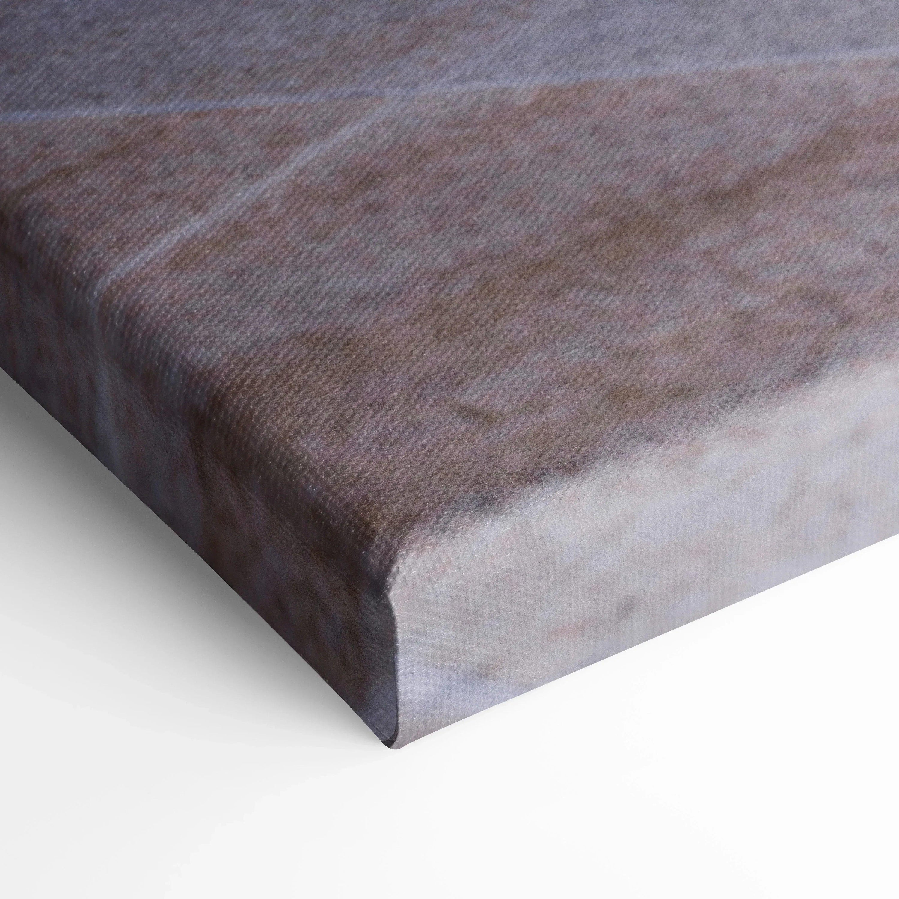 Close-up of textured canvas edge with fine weave, showcasing museum-quality wall art print.