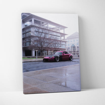 Vertical canvas art of a red Honda S2000 parked in front of modern glass building wall art.