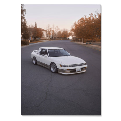 White Nissan 240sx S13 Silvia parked on empty street with autumn trees Poster Wall Art.