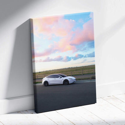 Tesla Model 3 Highland driving under pastel sunset sky on vertical canvas wall art.