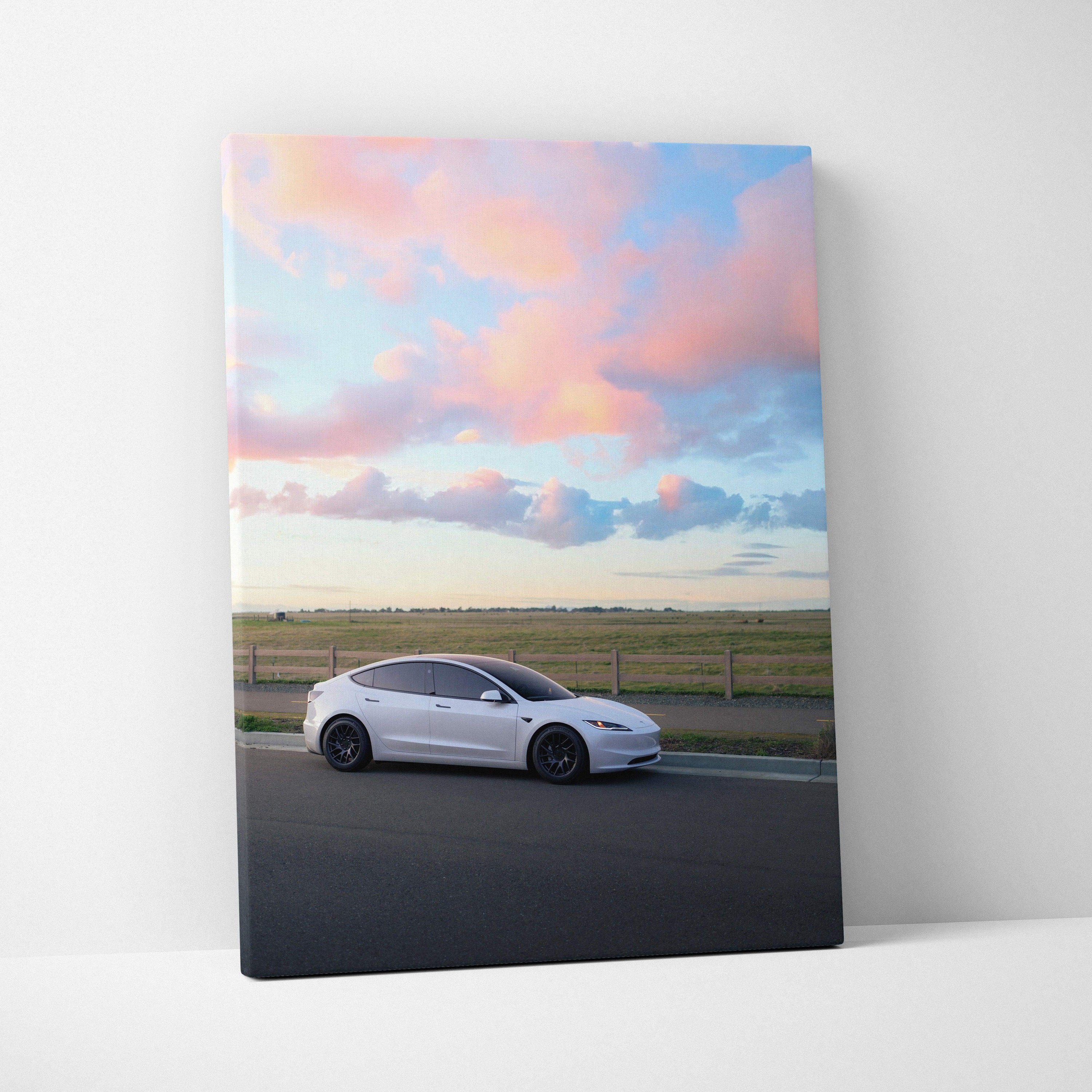 Tesla Model 3 Highland parked on road with colorful sunset sky canvas wall art.
