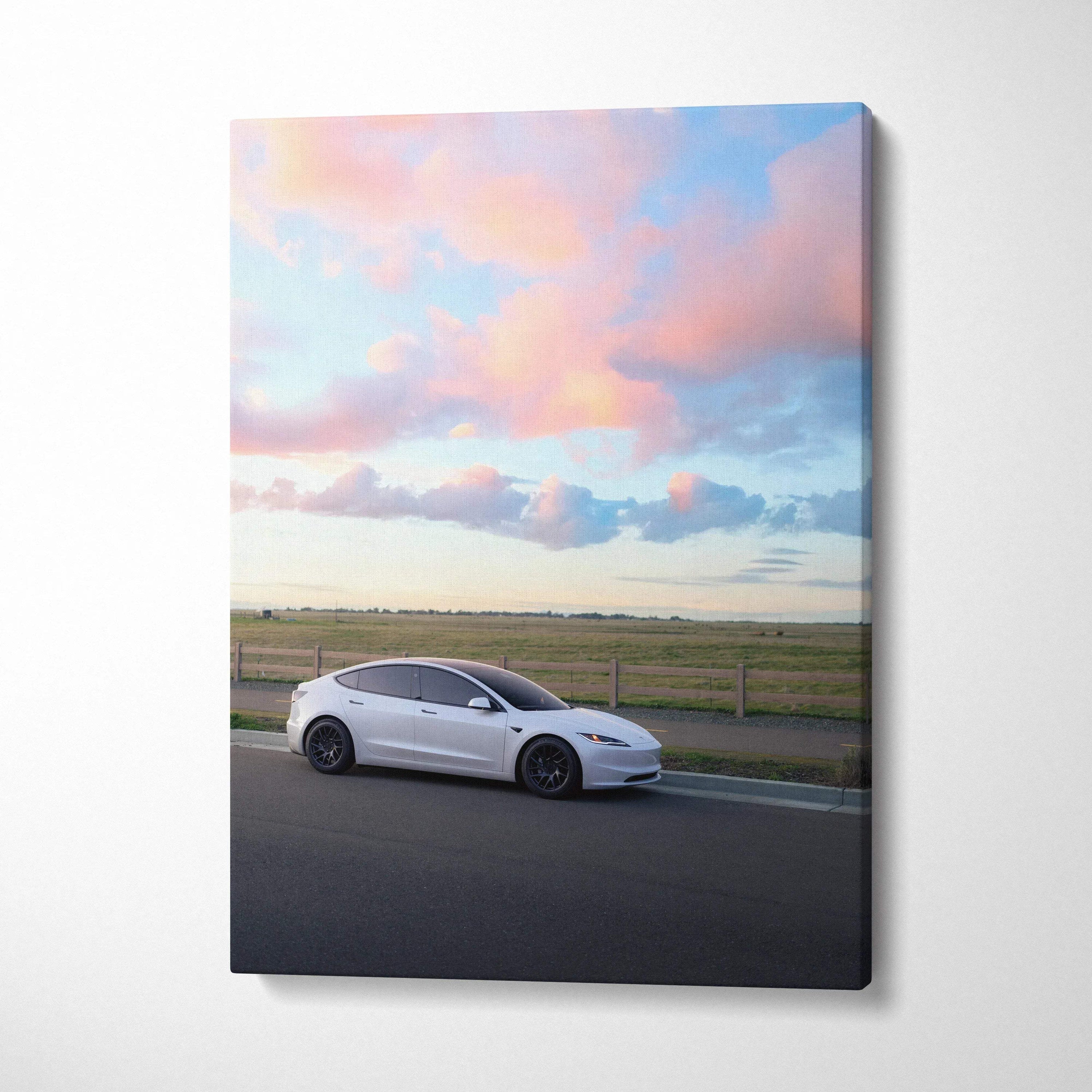 Tesla Model 3 Highland parked on road at sunset canvas wall art print with colorful sky.
