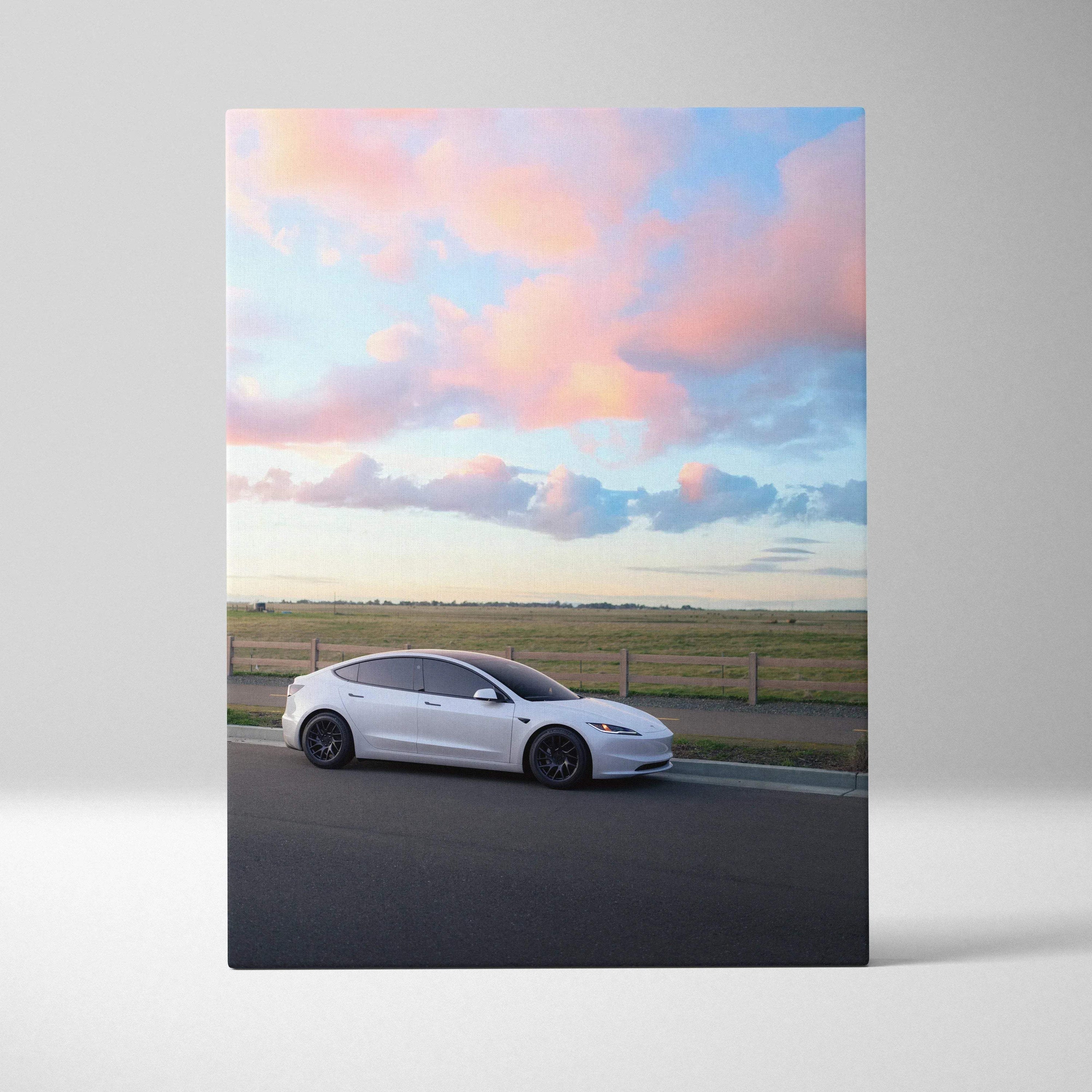 Tesla Model 3 Highland canvas art featuring white car on road with pastel sky wall art.