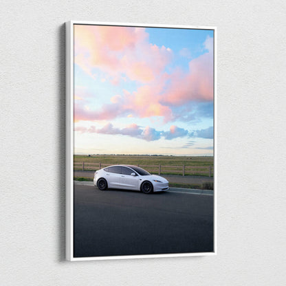 Tesla Model 3 Highland on road with colorful sunrise sky vertical canvas wall art.