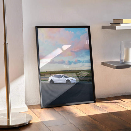 Tesla Model 3 Highland poster with scenic sky and road, modern wall art in black frame.