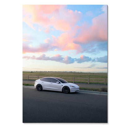 Tesla Model 3 Highland parked by roadside under pink and blue sky, poster wall art.