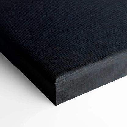 Close-up of black textured canvas corner showcasing high-resolution museum quality wall art material.