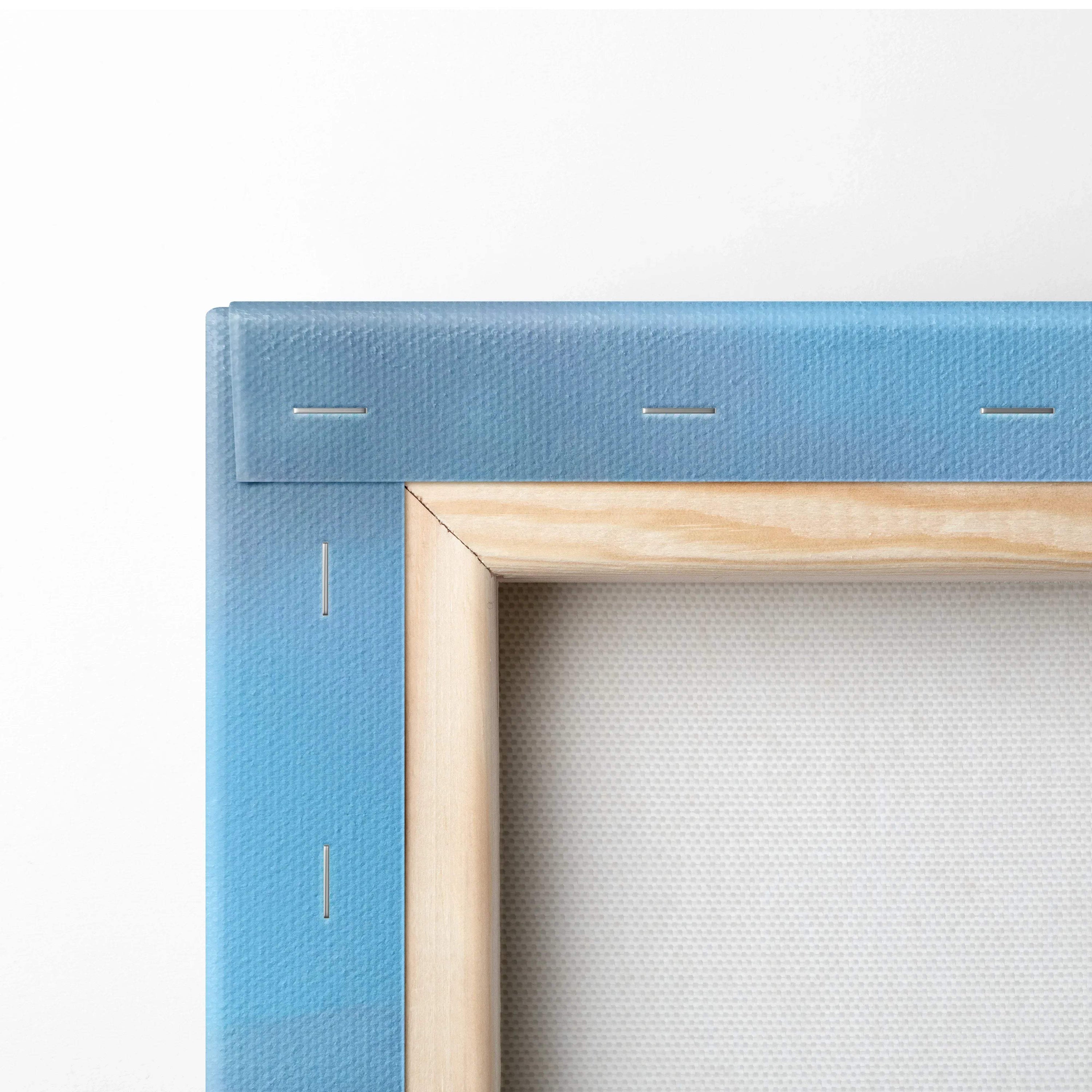 Close-up of blue-backed wooden frame stretched with canvas for wall art or museum-quality print.
