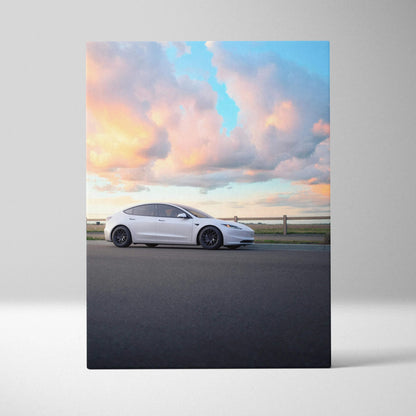 Tesla Model 3 Highland white car against sunset sky on vertical canvas wall art.