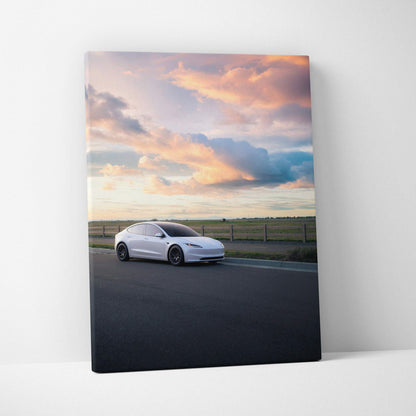 Tesla Model 3 Highland on road at sunset canvas wall art with vibrant sky and detailed car.