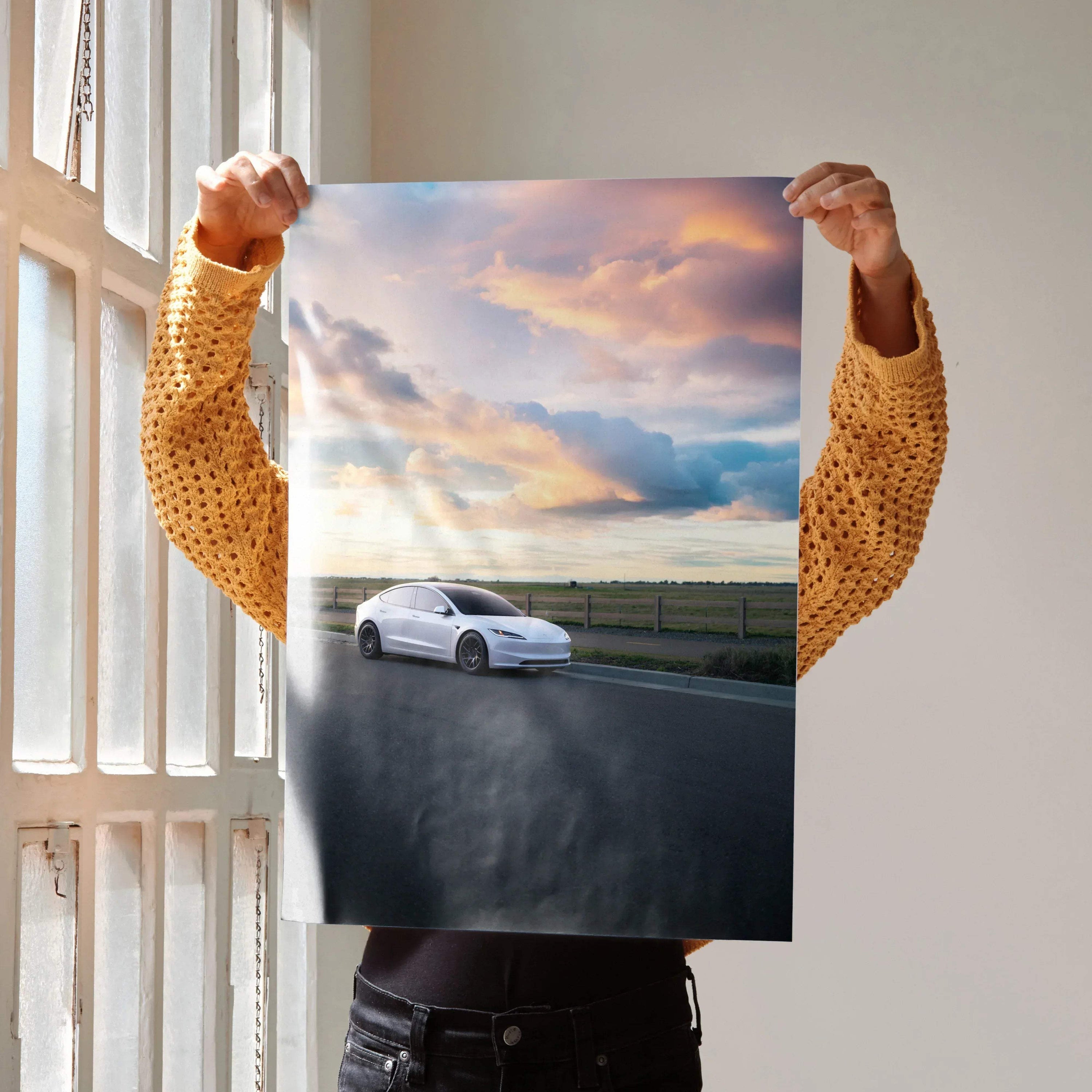 Tesla Model 3 Highland driving on open road at sunset poster wall art.